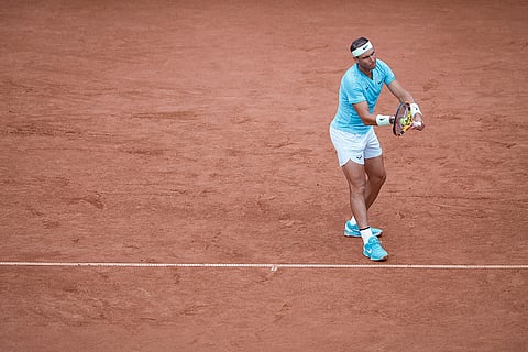 Rafael Nadal serves against Leo Borg
